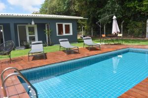A piscina localizada em Casa Bruna - Praia de Pipa ou nos arredores