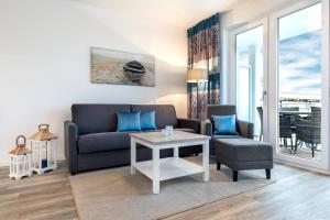 Ein Sitzbereich in der Unterkunft Apartmentanlage Meerblickvilla Apartmentanlage Meerblickvilla 2-18