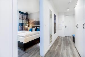 Ein Bett oder Betten in einem Zimmer der Unterkunft Apartmentanlage Meerblickvilla Apartmentanlage Meerblickvilla 2-18