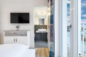 Ein Bett oder Betten in einem Zimmer der Unterkunft Apartmentanlage Meerblickvilla Apartmentanlage Meerblickvilla 2-18