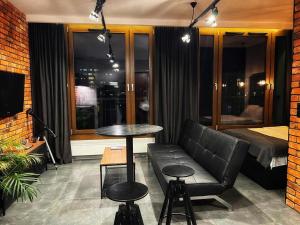 Posedenie v ubytovaní Loft Apartment Browary Warszawskie