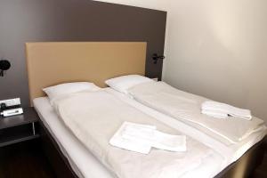 Postel nebo postele na pokoji v ubytování Resort Deichgraf Resort Deichgraf 31-15