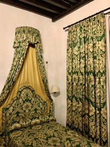 Postel nebo postele na pokoji v ubytování Hotel Boutique Casa de Orellana