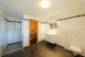 Vannituba majutusasutuses NordseeResort Friesland NordseeResort Friesland 52-4-N +15 fotot