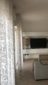 TV a/nebo společenská místnost v ubytování Luxury Affitti brevi