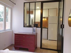 Kuchyň nebo kuchyňský kout v ubytování Appartements de l'Eglise