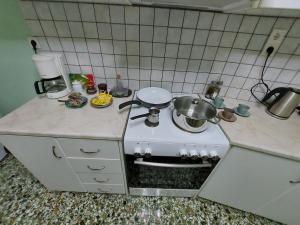 A kitchen or kitchenette at "Vasiliki" Home
