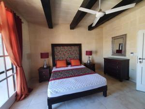 Postel nebo postele na pokoji v ubytování Petra Farmhouse B&B