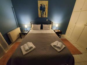A bed or beds in a room at "Vasiliki" Home