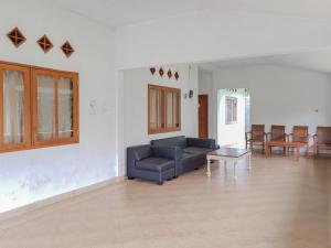 Posezení v ubytování Bumi Ciboled Mitra RedDoorz near Gerbang Tol Pamulihan