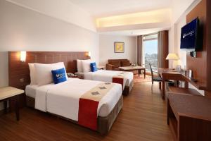 TV a/nebo společenská místnost v ubytování Hotel Bidakara Jakarta + 19 fotografií