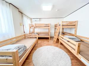 Postel nebo postele na pokoji v ubytování Empathy Guesthouse