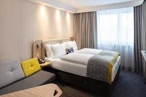 Postel nebo postele na pokoji v ubytování Holiday Inn Express - Aarburg - Oftringen by IHG