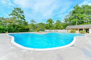 Πισίνα στο ή κοντά στο Villas of Bethany West --- 796 Salt Pond Circle Unit B