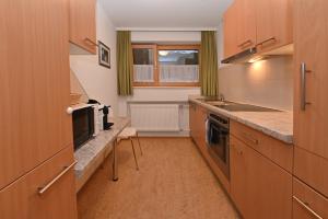 Kuchyň nebo kuchyňský kout v ubytování Appartements Künk