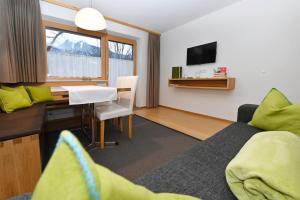 TV a/nebo společenská místnost v ubytování Appartements Künk
