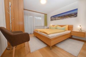 Postel nebo postele na pokoji v ubytování Appartements Künk