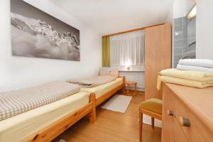 Postel nebo postele na pokoji v ubytování Appartements Künk
