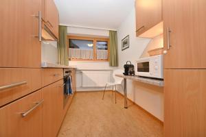 Kuchyň nebo kuchyňský kout v ubytování Appartements Künk