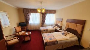 Postel nebo postele na pokoji v ubytování Eurohotel
