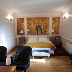 Postel nebo postele na pokoji v ubytování Les Chambres du Château du Rozel