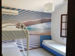 Postel nebo postele na pokoji v ubytování villa rubia