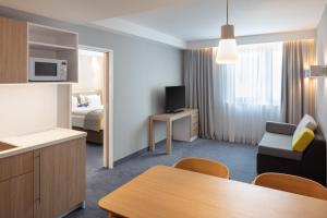 TV a/nebo společenská místnost v ubytování Holiday Inn Express - Aarburg - Oftringen by IHG
