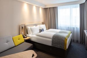 Postel nebo postele na pokoji v ubytování Holiday Inn Express - Aarburg - Oftringen by IHG