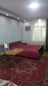 Postel nebo postele na pokoji v ubytování Madoyan Guest house