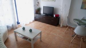 TV a/nebo společenská místnost v ubytování Apartamento Playa Moncofar - Xilxes