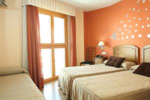 Postel nebo postele na pokoji v ubytování Hostal Campo Real Bed&Breakfast