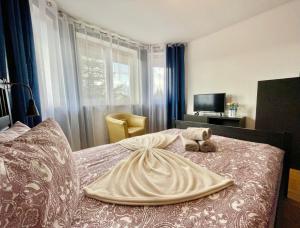 Ένα ή περισσότερα κρεβάτια σε δωμάτιο στο Domowe Zalesie