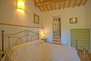 A bed or beds in a room at Villa Panizzi by PosarelliVillas