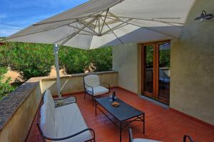 A balcony or terrace at Villa Panizzi by PosarelliVillas