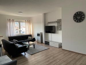 TV a/nebo společenská místnost v ubytování E&B Apartments Korb