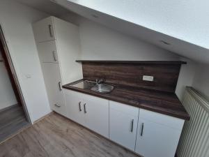 Kuchyň nebo kuchyňský kout v ubytování Haus Bergler