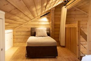 Кровать или кровати в номере Gîte La Perhotte