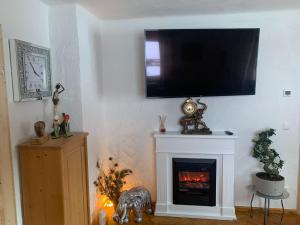 A television and/or entertainment centre at Holiday Home Muhr near Katschberg Ski Area