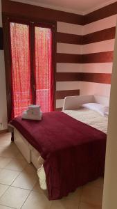 Postel nebo postele na pokoji v ubytování ALBERGO 900Strati