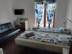 Postel nebo postele na pokoji v ubytování Hosteria na Mazurach