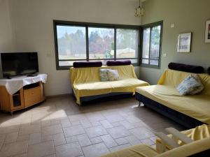 Säng eller sängar i ett rum på Holiday home in Galilee