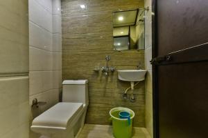 Koupelna v ubytování Hotel Guestinn Residency