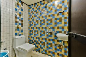 Koupelna v ubytování Hotel Guestinn Residency