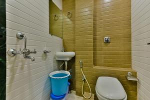Koupelna v ubytování Hotel Guestinn Residency