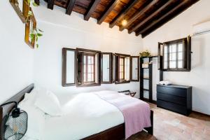 A bed or beds in a room at Casa Ispal Alfalfa