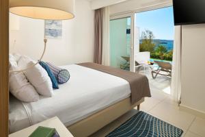 Posteľ alebo postele v izbe v ubytovaní TUI BLUE Adriatic Beach - Adults Only - All Inclusive