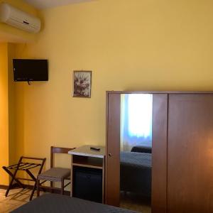 TV a/nebo společenská místnost v ubytování Hotel La Querceta