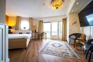Postel nebo postele na pokoji v ubytování Fletcher Hotel-Restaurant Arion-Vlissingen