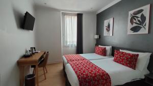 Hotel Boréal Nice tesisinde bir odada yatak veya yataklar