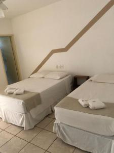 Postel nebo postele na pokoji v ubytování Mar & Sol Praia Hotel